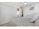 Bedroom features a double bed and a storage closet at 4260 Placida Rd # 13B, Englewood, FL 34224