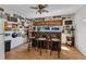 Unique bar area featuring a custom wood bar, comfortable seating, and eclectic wall decor for a fun and inviting space at 4359 Pocatella Ave, North Port, FL 34287