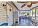 Relaxing screened-in patio area with comfortable seating and plenty of natural light at 4359 Pocatella Ave, North Port, FL 34287