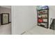 Practical storage area featuring a safe and shelving for ample storage solutions at 4359 Pocatella Ave, North Port, FL 34287