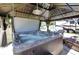 Hot tub with open lid inside of backyard gazebo at 4474 Ozark Ave, North Port, FL 34287