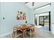 Cozy dining area adjacent to kitchen with a modern table and chairs at 4569 Kenvil Dr, North Port, FL 34288