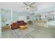 Bright, open-concept living space connects the living room, dining area, and kitchen at 4569 Kenvil Dr, North Port, FL 34288