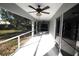 Screened in patio with dual ceiling fans for a comfortable outdoor living experience at 4749 Oakley Rd, North Port, FL 34288