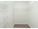 This closet features wire shelving, neutral walls and vinyl plank flooring at 5611 Ganyard Ave, North Port, FL 34291