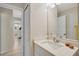 Neutrally decorated bathroom with shower over bath, and modern fixtures at 6235 Bixel Ln, Englewood, FL 34224