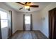 Bedroom featuring windows for natural light and new flooring at 6272 Sooner St, North Port, FL 34287
