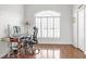 Bright home office featuring a large window with shutters and sleek modern desk at 7200 Riverside Dr, Punta Gorda, FL 33982