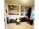 Bright home office featuring laminate flooring, modern decor and ample natural light at 7232 W Lenox Cir, Punta Gorda, FL 33950