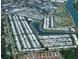 This aerial view shows a waterfront community with extensive recreational facilities at 805 S Green Cir, Venice, FL 34285