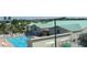 Enjoy the community pool with ample seating, mature landscaping and available basketball, perfect for recreation at 805 S Green Cir, Venice, FL 34285