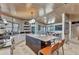 Gourmet kitchen with a large center island, stainless appliances, and stone countertops at 810 Napoli Ln, Punta Gorda, FL 33950
