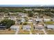 Aerial view of the property and neighborhood with tree coverage at 8238 San Jacinto Ave, North Port, FL 34287