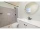Bathroom with a tiled shower, and a modern vanity and mirror at 8238 San Jacinto Ave, North Port, FL 34287