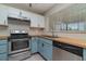 Modern kitchen featuring stainless steel appliances and butcher block countertops at 8238 San Jacinto Ave, North Port, FL 34287