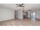Spacious living room with new floors and modern ceiling fans at 8238 San Jacinto Ave, North Port, FL 34287