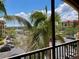 Enjoy the scenic views from this screened lanai with palm trees and a fountain at 98 Vivante Blvd # 9834, Punta Gorda, FL 33950