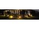 Well-lit front yard with lush landscaping enhances the curb appeal of this charming single-story home at 11105 Pendleton Ave, Englewood, FL 34224