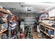 A cluttered garage filled with tools and sporting goods at 11105 Pendleton Ave, Englewood, FL 34224