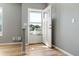 Bright entryway with hardwood flooring and neutral paint at 11136 Grapefruit Ln, Punta Gorda, FL 33955