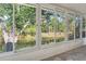 This is a sunroom view of backyard waterfront at 11136 Grapefruit Ln, Punta Gorda, FL 33955