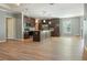 Open floor plan with kitchen, dining, and living room perfect for entertaining at 11136 Grapefruit Ln, Punta Gorda, FL 33955