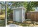 This backyard features an outdoor storage shed at 11136 Grapefruit Ln, Punta Gorda, FL 33955