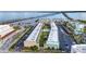 Beautiful aerial view of a waterfront condominium complex near a scenic bridge and the coast at 150 Harborside Ave # 134, Punta Gorda, FL 33950