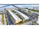 Wide aerial view of condo complex near marina and scenic bridge at 150 Harborside Ave # 134, Punta Gorda, FL 33950