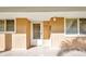 Condo 134 featuring wood paneling, new front door, and tiled front porch at 150 Harborside Ave # 134, Punta Gorda, FL 33950