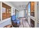 Enclosed lanai offering plenty of natural light, a ceiling fan, and comfortable wicker seating at 150 Harborside Ave # 134, Punta Gorda, FL 33950