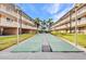 The shuffleboard courts sit between the condo buildings at 150 Harborside Ave # 134, Punta Gorda, FL 33950