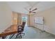 Comfortable office space featuring a modern desk, chair and a whiteboard at 18135 Lake Worth Blvd, Port Charlotte, FL 33948
