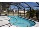 Inviting screened-in pool perfect for relaxing or entertaining at 18135 Lake Worth Blvd, Port Charlotte, FL 33948