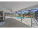 Outdoor pool area featuring a pool, covered patio and screened enclosure at 18135 Lake Worth Blvd, Port Charlotte, FL 33948