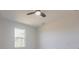 Bedroom featuring a large window providing natural light and a modern ceiling fan at 1816 Braddock Ave, North Port, FL 34288