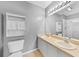 Bathroom featuring double sinks, a large mirror and shower at 2061 Willow Hammock Cir # 303, Punta Gorda, FL 33983