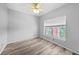Cozy bedroom with natural light and modern flooring at 2061 Willow Hammock Cir # 303, Punta Gorda, FL 33983