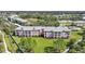 Beautifully maintained condo building with lush green lawn at 2061 Willow Hammock Cir # 303, Punta Gorda, FL 33983