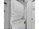 Laundry room with stacked washer and dryer at 2061 Willow Hammock Cir # 303, Punta Gorda, FL 33983
