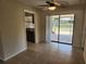 Cozy dining area with sliding glass doors leading to the backyard patio at 21035 Exmore Ave, Port Charlotte, FL 33952