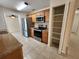 The kitchen has an open layout, stainless steel appliances, and a pantry at 21035 Exmore Ave, Port Charlotte, FL 33952