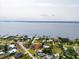 Waterfront property with stunning views of the water and neighboring homes with private docks at 23491 Harper Ave, Punta Gorda, FL 33980