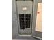 Close-up of an open electrical panel featuring multiple circuit breakers for managing the home's power distribution at 25225 Rampart Blvd # 1801, Punta Gorda, FL 33983