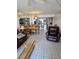 Open living and dining area featuring tile flooring and a modern kitchen at 25225 Rampart Blvd # 1801, Punta Gorda, FL 33983