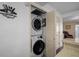Conveniently located stacked washer and dryer laundry unit in closet at 26290 Rampart Blvd # D, Punta Gorda, FL 33983