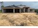 Under construction home featuring gray block construction and architectural details at 277 Long Meadow Ln, Rotonda West, FL 33947