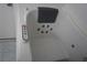 Close-up of a walk-in bathtub with jets and electronic controls at 29211 Picador St, Punta Gorda, FL 33982