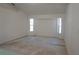 Bright, spacious bedroom with large windows providing natural light and white walls at 29211 Picador St, Punta Gorda, FL 33982