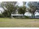 Community park with picnic tables and lake views, perfect for outdoor gatherings at 29211 Picador St, Punta Gorda, FL 33982